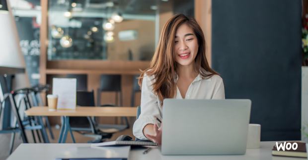 female business owner checking her email